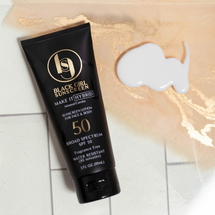 Black Girl Sunscreen SPF 50 black tube of sunscreen lotion for face and body with white lotion swatch