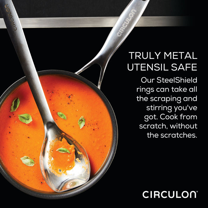 Showcasing the 3.5 Quart Covered Chef Pan with Spoon, this Circulon SteelShield advertisement highlights a perfect pairing with tomato soup and utensils.