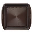 The 9-Inch Nonstick Square Cake Pan is crafted from durable steel and features a ridged surface along with integrated handles.