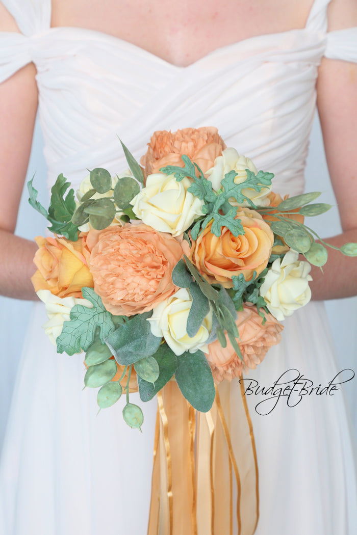 Small Bridal bouquet with apricot and cream roses and peonies with sage greenery and ribbon