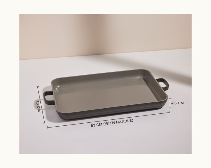 The Bakeware Set includes a rectangular ceramic baker with handles, measuring 53 cm long (with handles), 30 cm wide, and 4.6 cm deep, displayed on a flat surface.