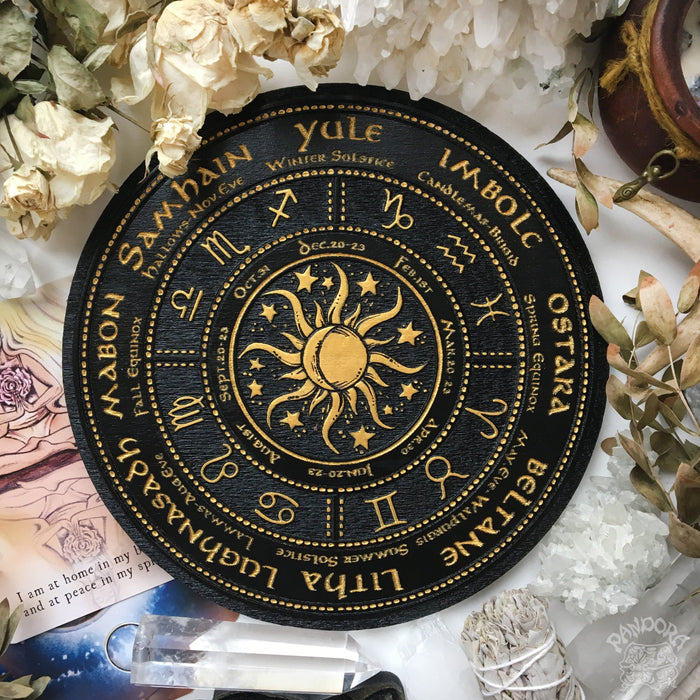 Wooden Wheel of the Year - calendar of pagan festivals and seasonal sabbaths: Yule, Imbolc, Ostara, Beltane, Litha, Lammas, Mabon, Samhain.