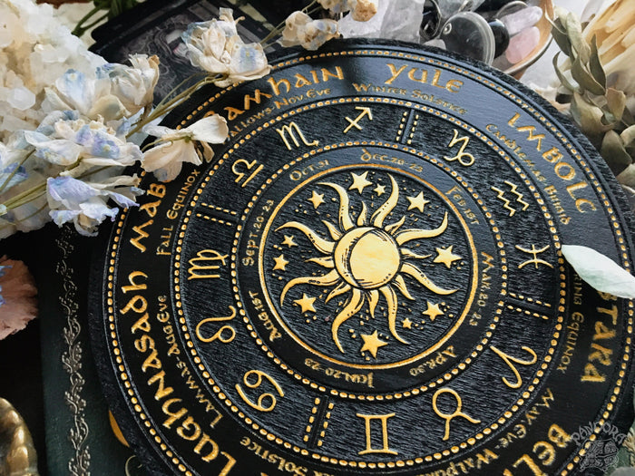 Wooden Wheel of the Year - calendar of pagan festivals and seasonal sabbaths: Yule, Imbolc, Ostara, Beltane, Litha, Lammas, Mabon, Samhain.